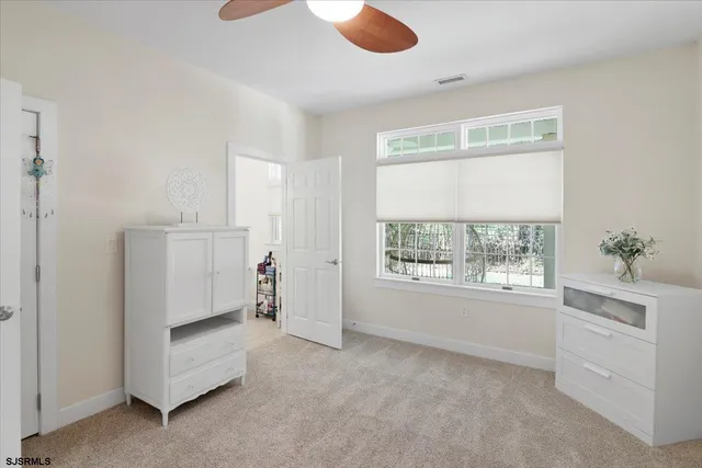 an aerial view of residential house with outdoor space