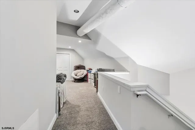 a view of a house with yard and tree s