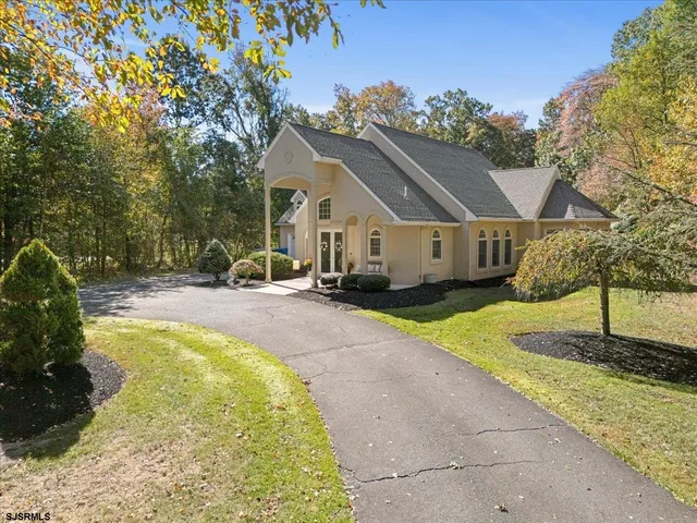 a swimming pool view with a outdoor seating
