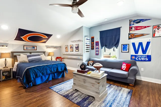 a bathroom with a granite countertop toilet a sink and a mirror