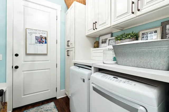 a bathroom with a granite countertop toilet sink and mirror