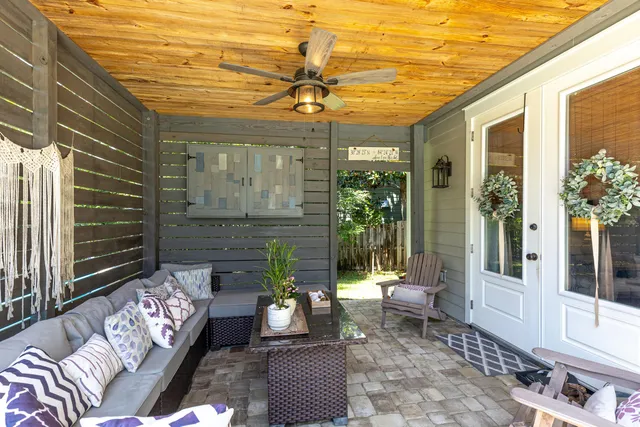 a view of a swimming pool with lounge chair in the patio