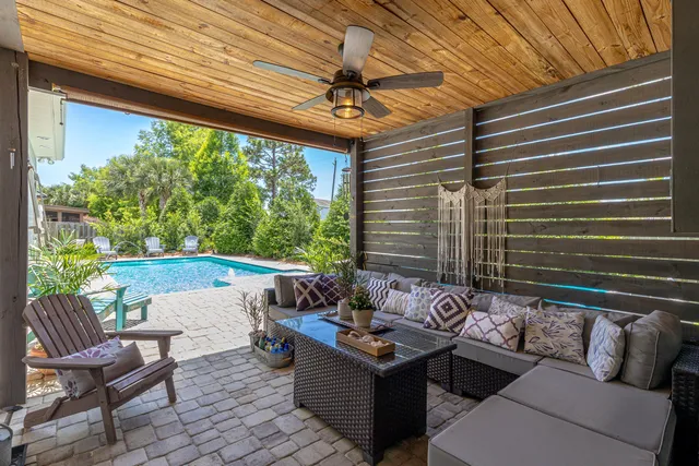 a outdoor living space with furniture and garden view