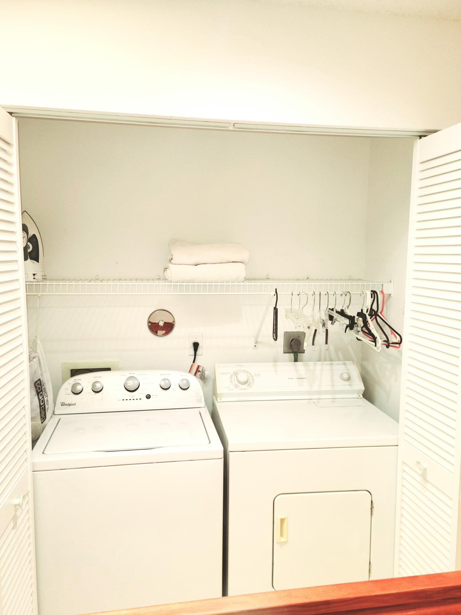 5121 Sabal Gardens Lane, Unit 2 Boca Raton, FL 33487 - Photo 18 of 25 a utility room with dryer and washer