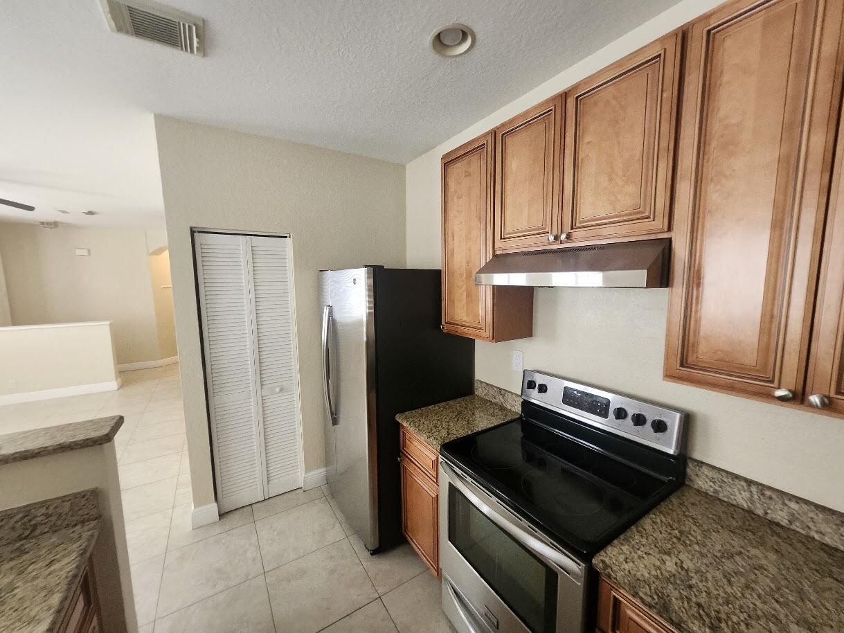 3189 Laurel Ridge Circle Riviera Beach, FL 33404 - Photo 3 of 20 20260730_152820