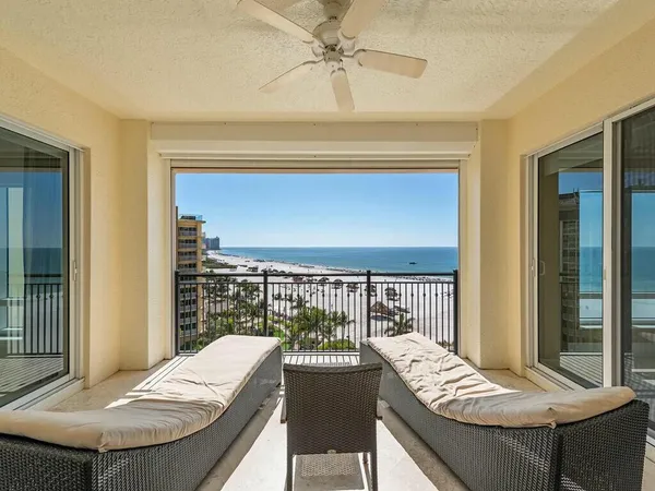 a view of a balcony dining area