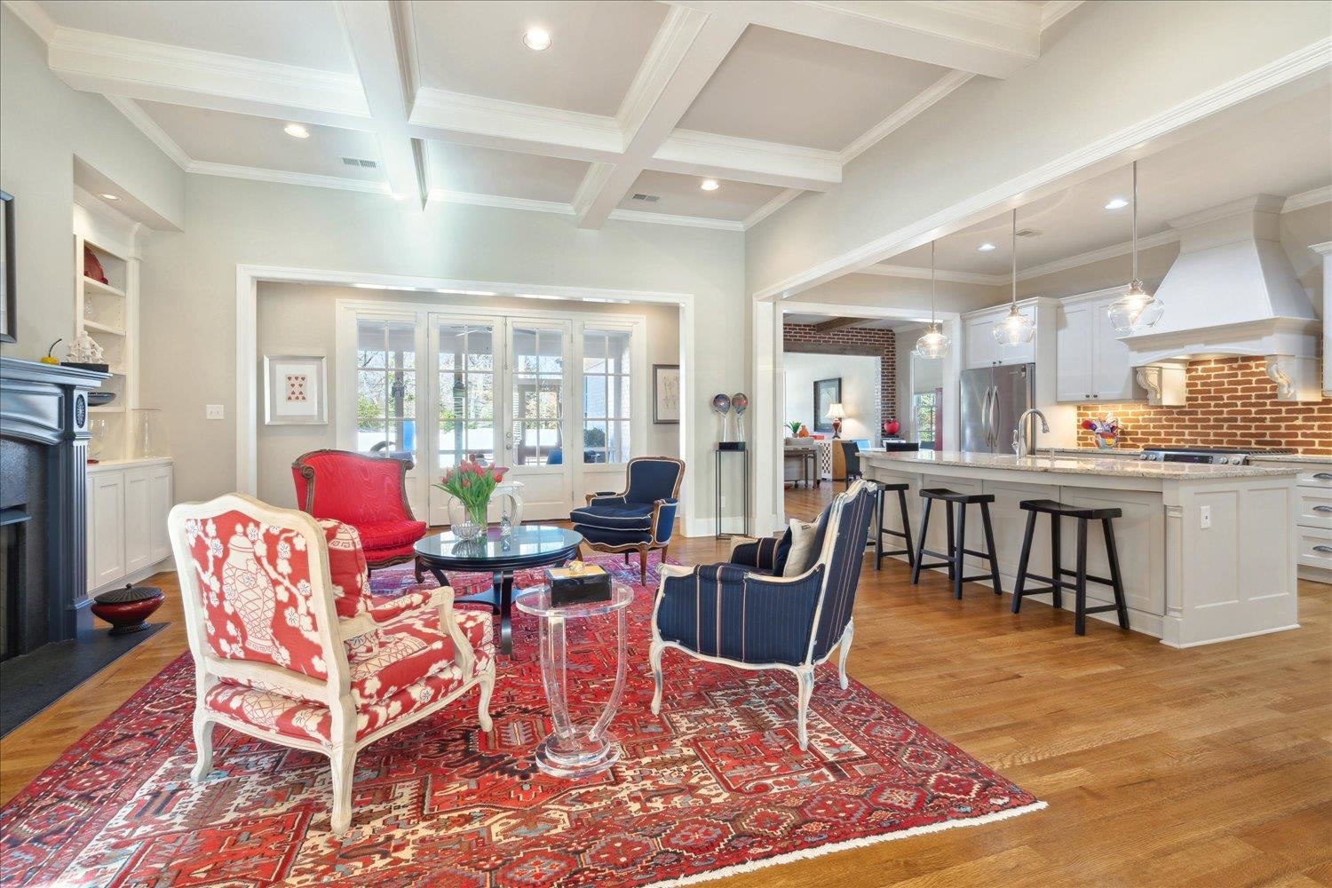 5140 Shady Grove Road Memphis, TN 38117 - Photo 11 of 39 a living room with furniture a flat screen tv and a table