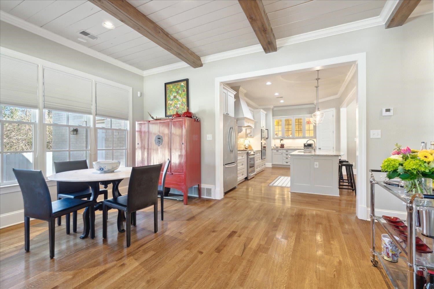 5140 Shady Grove Road Memphis, TN 38117 - Photo 16 of 39 a view of a dining room with furniture and a potted plant