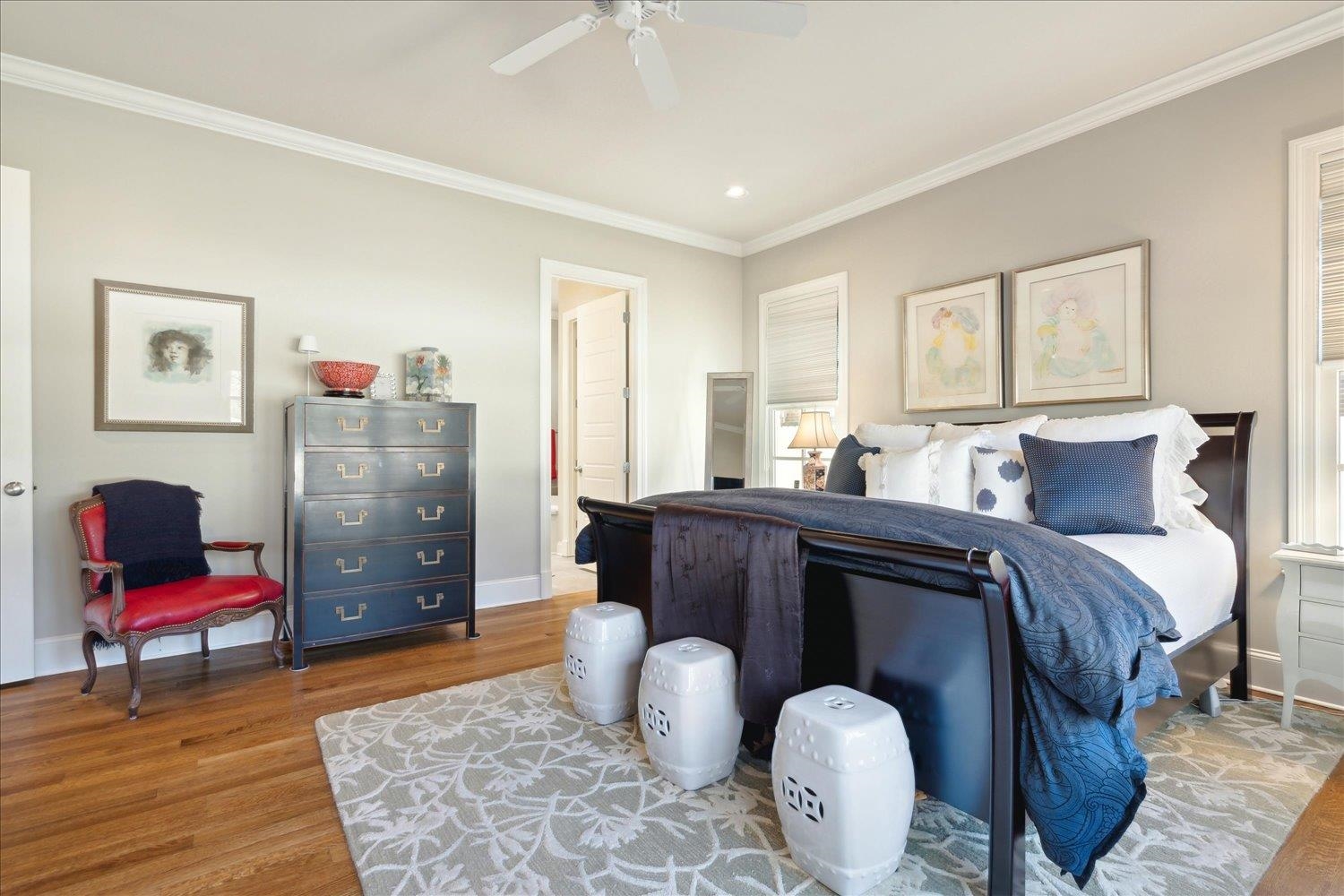 5140 Shady Grove Road Memphis, TN 38117 - Photo 21 of 39 a bedroom with a bed and wooden floor