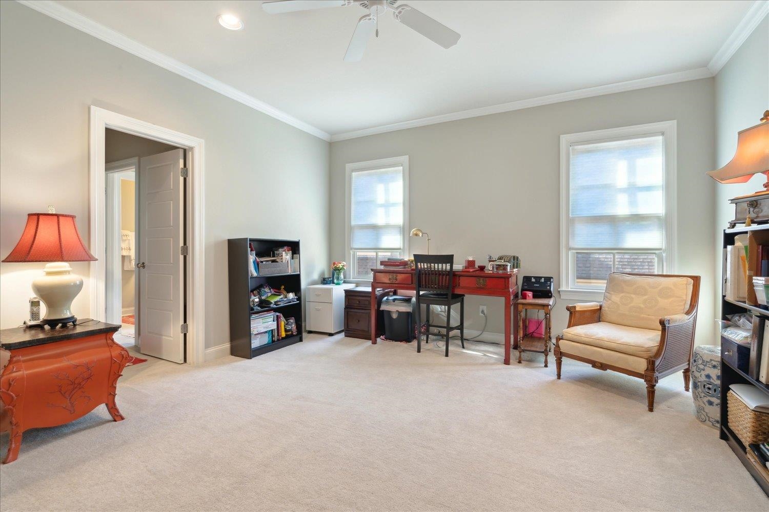 5140 Shady Grove Road Memphis, TN 38117 - Photo 29 of 39 a living room with furniture and a flat screen tv