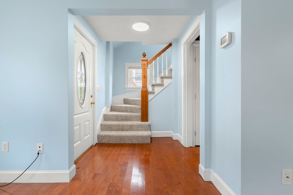 5 Harrison Street Maynard, MA 01754 - Photo 4 of 29 a view of entryway with wooden floor