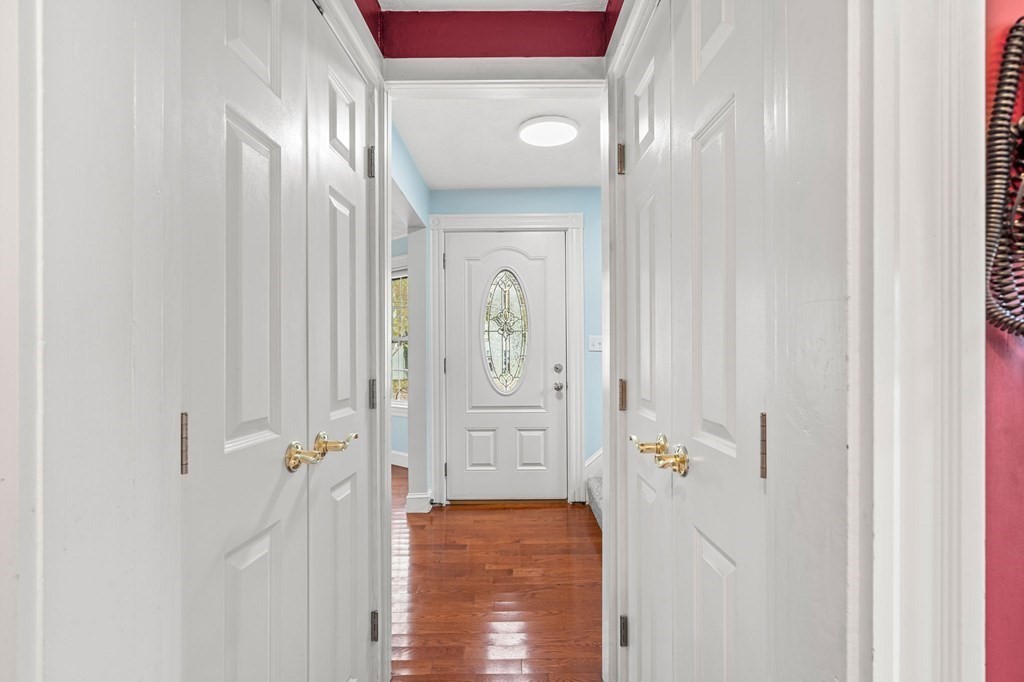 5 Harrison Street Maynard, MA 01754 - Photo 5 of 29 a bathroom with a granite countertop mirror and a shower