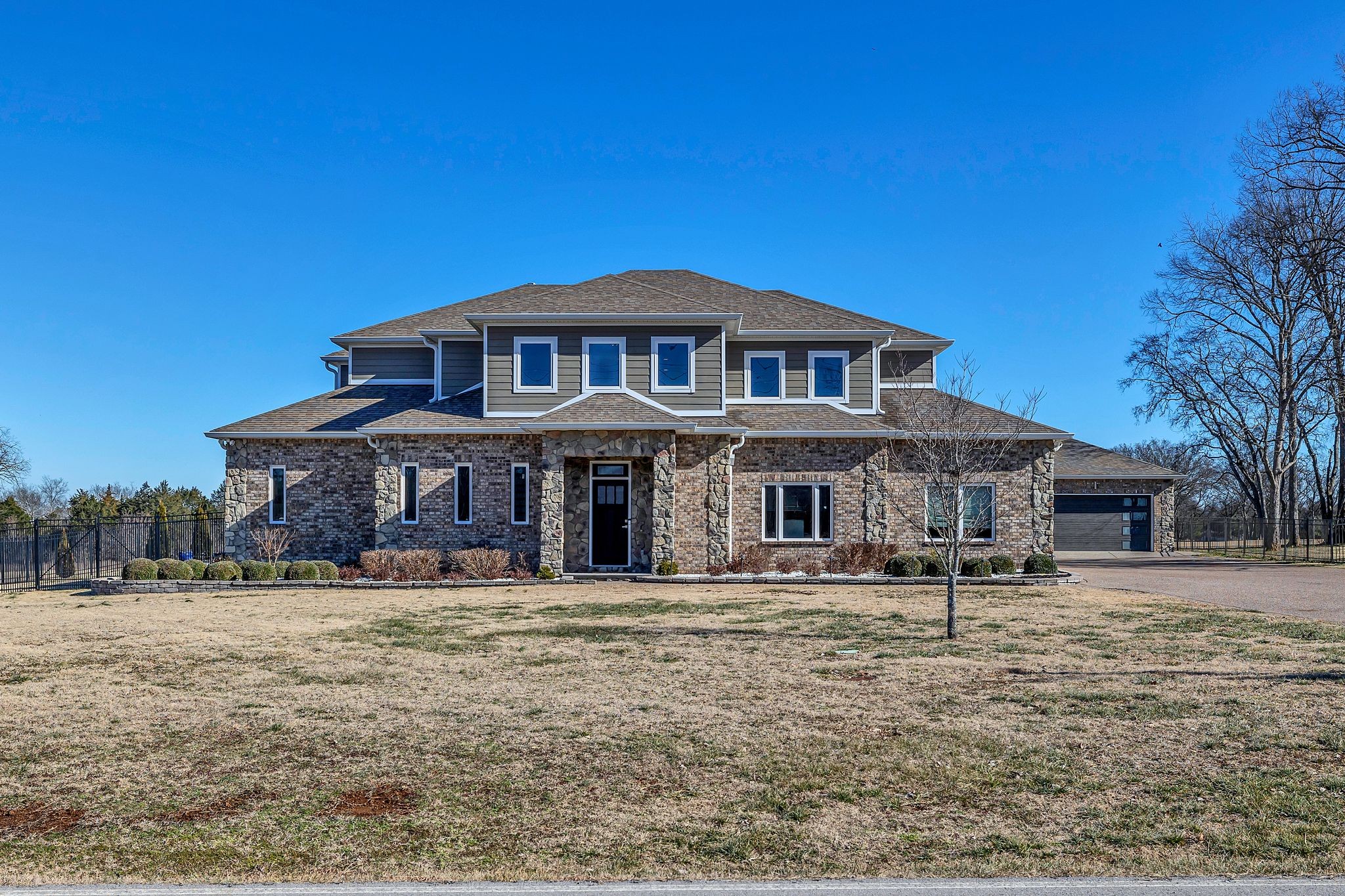 8200 Mona Road Murfreesboro, TN 37129 - Photo 1 of 73 a front view of a house with a yard
