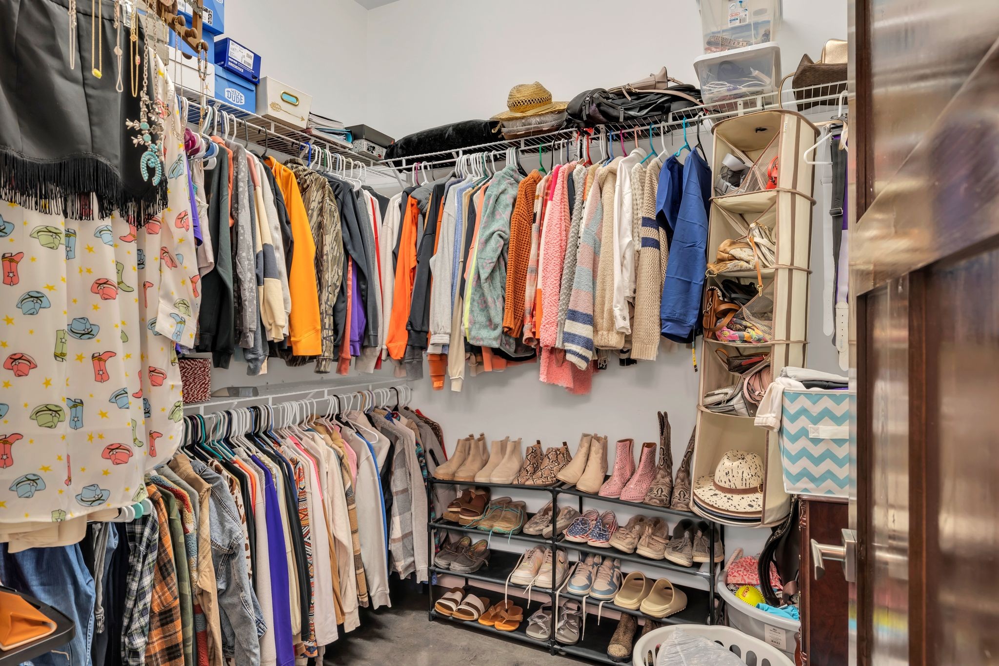 8200 Mona Road Murfreesboro, TN 37129 - Photo 29 of 73 a view of walk in closet with clothes and shoes