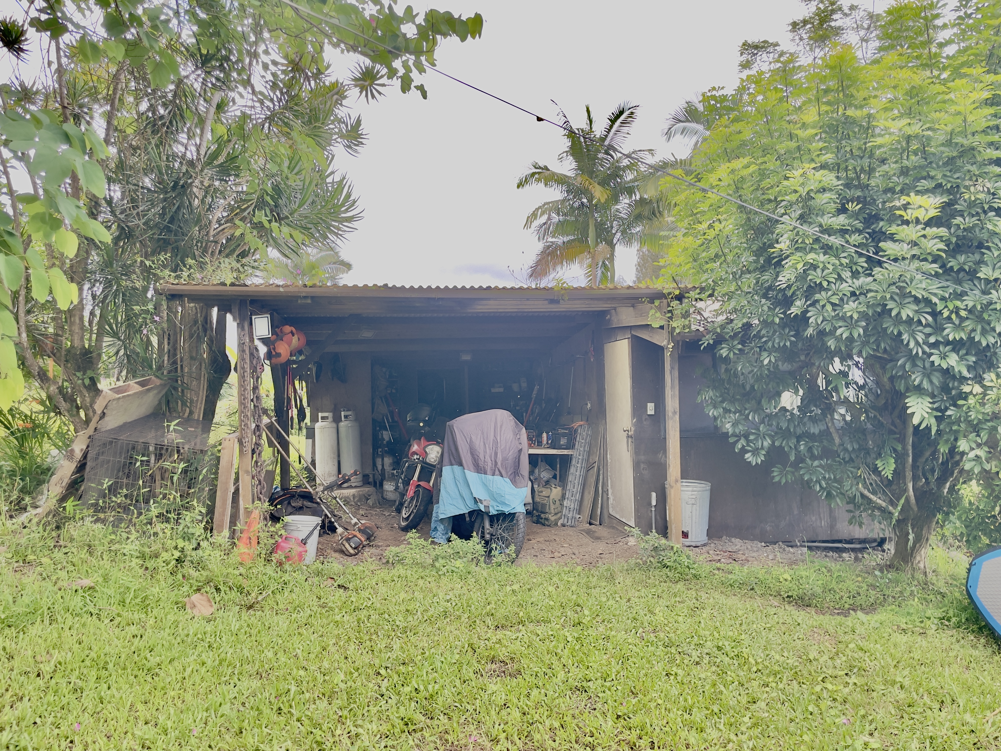 84-539 Telephone Exchange Road Captain Cook, HI 96704 - Photo 19 of 30 a view of a porch with a table and chairs