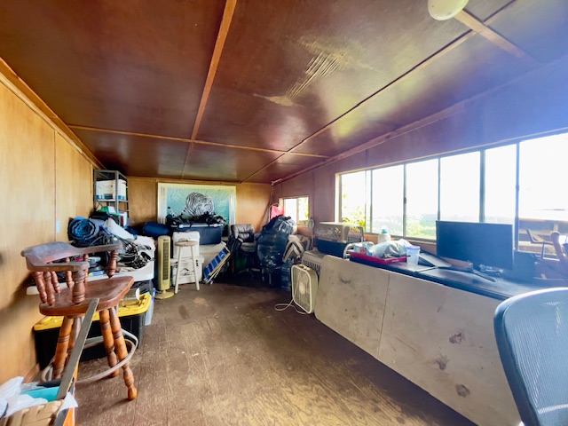 84-539 Telephone Exchange Road Captain Cook, HI 96704 - Photo 21 of 30 a living room with furniture a air conditioner vent and a window