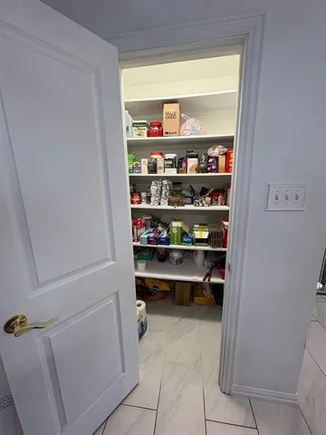 a room with storage and utility