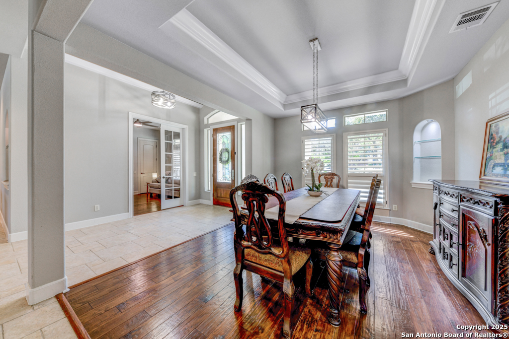 142 Candelaria Helotes, TX 78023 - Photo 15 of 53 a view of a dining room with furniture window and wooden floor