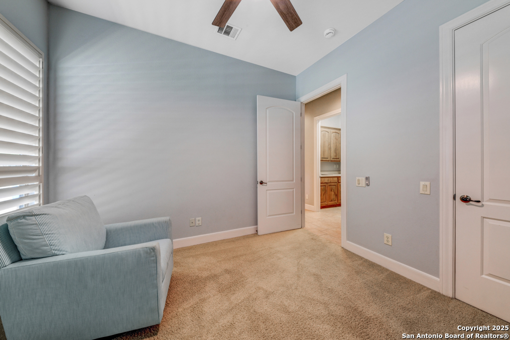 142 Candelaria Helotes, TX 78023 - Photo 33 of 53 a living room with furniture and a ceiling fan