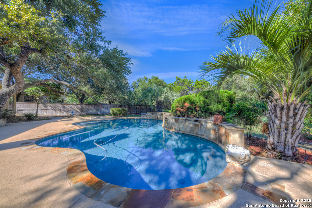 142 Candelaria Helotes, TX 78023 - Photo 38 of 53 a view of a swimming pool with a patio