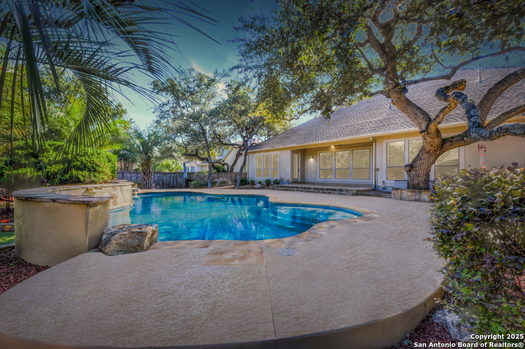 142 Candelaria Helotes, TX 78023 - Photo 39 of 53 a view of outdoor space yard and swimming pool