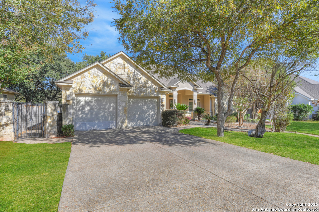142 Candelaria Helotes, TX 78023 - Photo 5 of 53 a view of a house next to a yard and road
