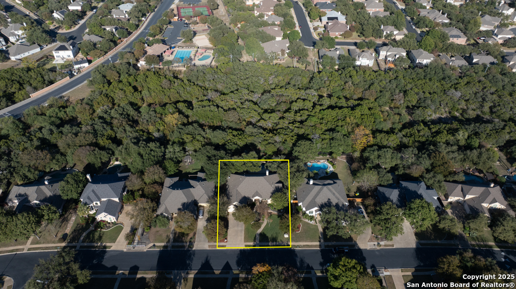 142 Candelaria Helotes, TX 78023 - Photo 52 of 53 an aerial view of a residential houses with outdoor space and street view