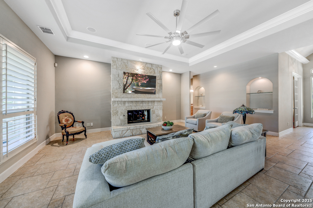 142 Candelaria Helotes, TX 78023 - Photo 8 of 53 a living room with furniture and a fireplace