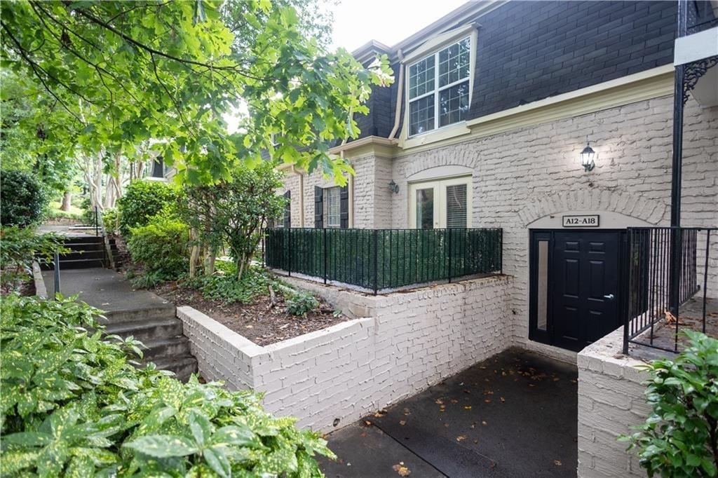 2805 Northeast Expressway, Unit A14 Atlanta, GA 30345 - Photo 2 of 13 a view of a chairs and table in the backyard