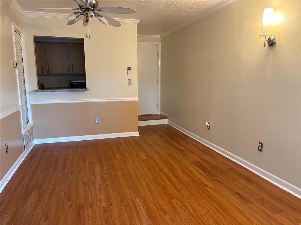 2805 Northeast Expressway, Unit A14 Atlanta, GA 30345 - Photo 6 of 13 wooden floor in an empty room