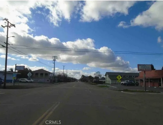 a view of city street with cars