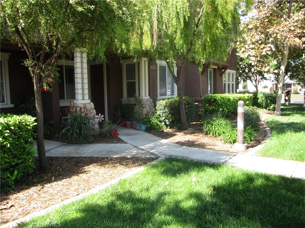 3980 Polk Street, Unit D Riverside, CA 92505 - Photo 1 of 1 a view of a house with a yard and tree s