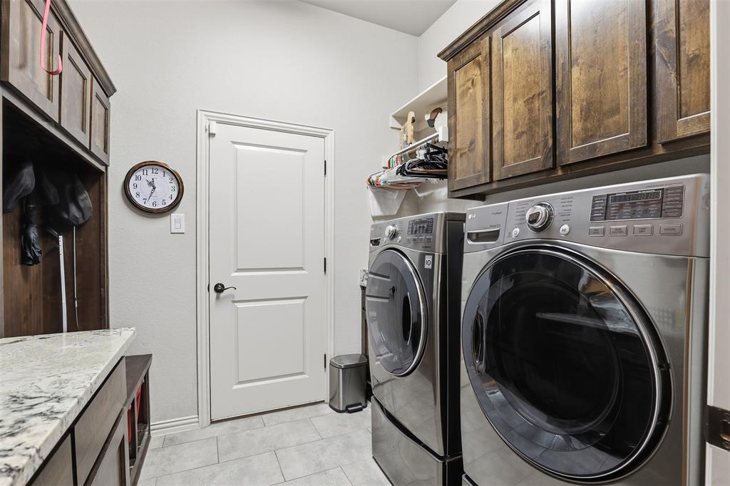 140 Flying Diamond Drive Springtown, TX 76082 - Photo 26 of 30 a view of a storage & utility room with a washer dryer