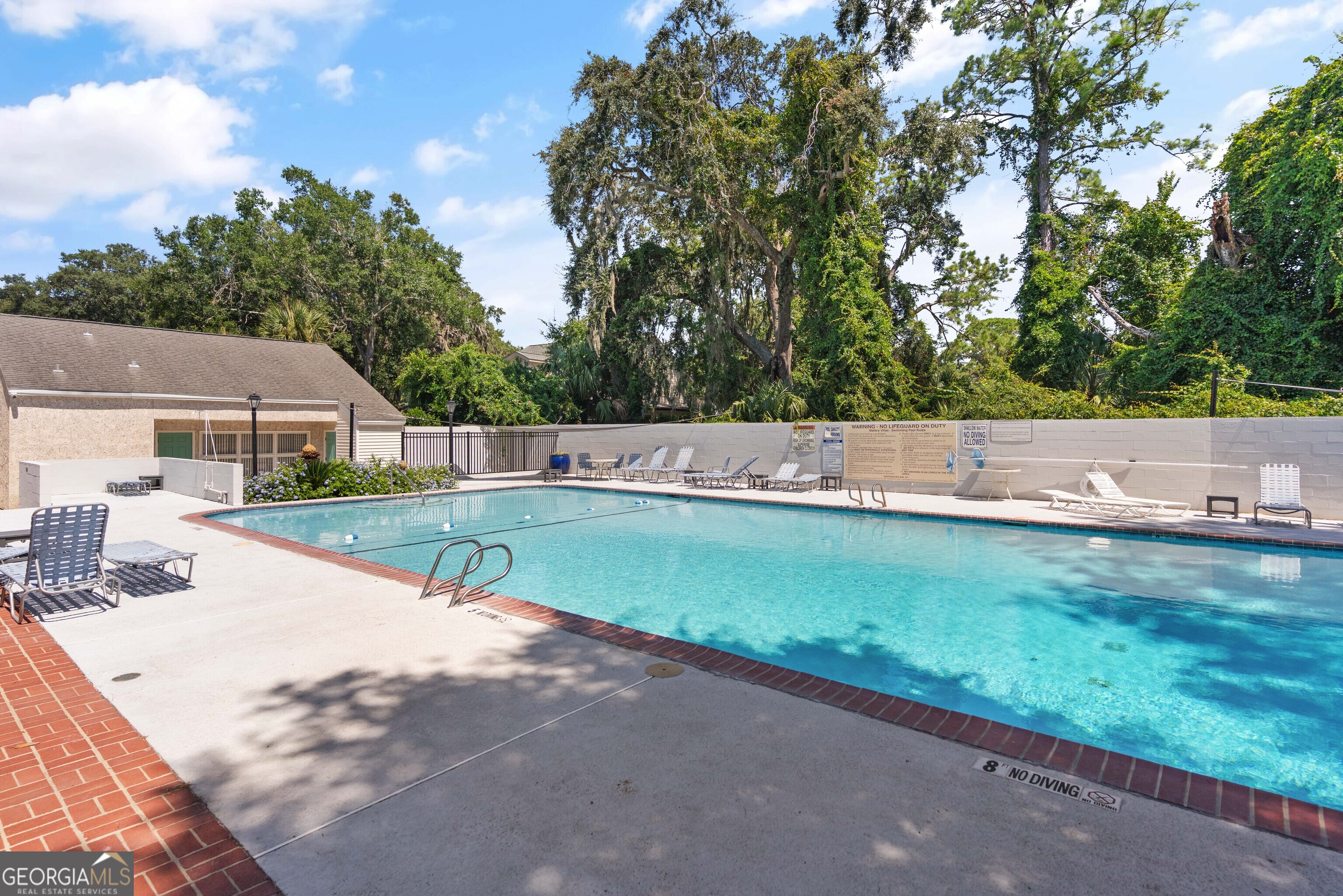 1000 Mallery St Extension, Unit B5 St. Simons, GA 31522 - Photo 23 of 24 a view of a house with a yard