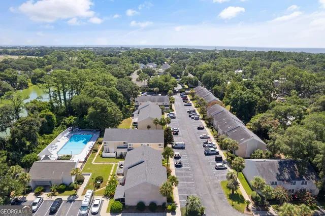 an aerial view of a house with outdoor space