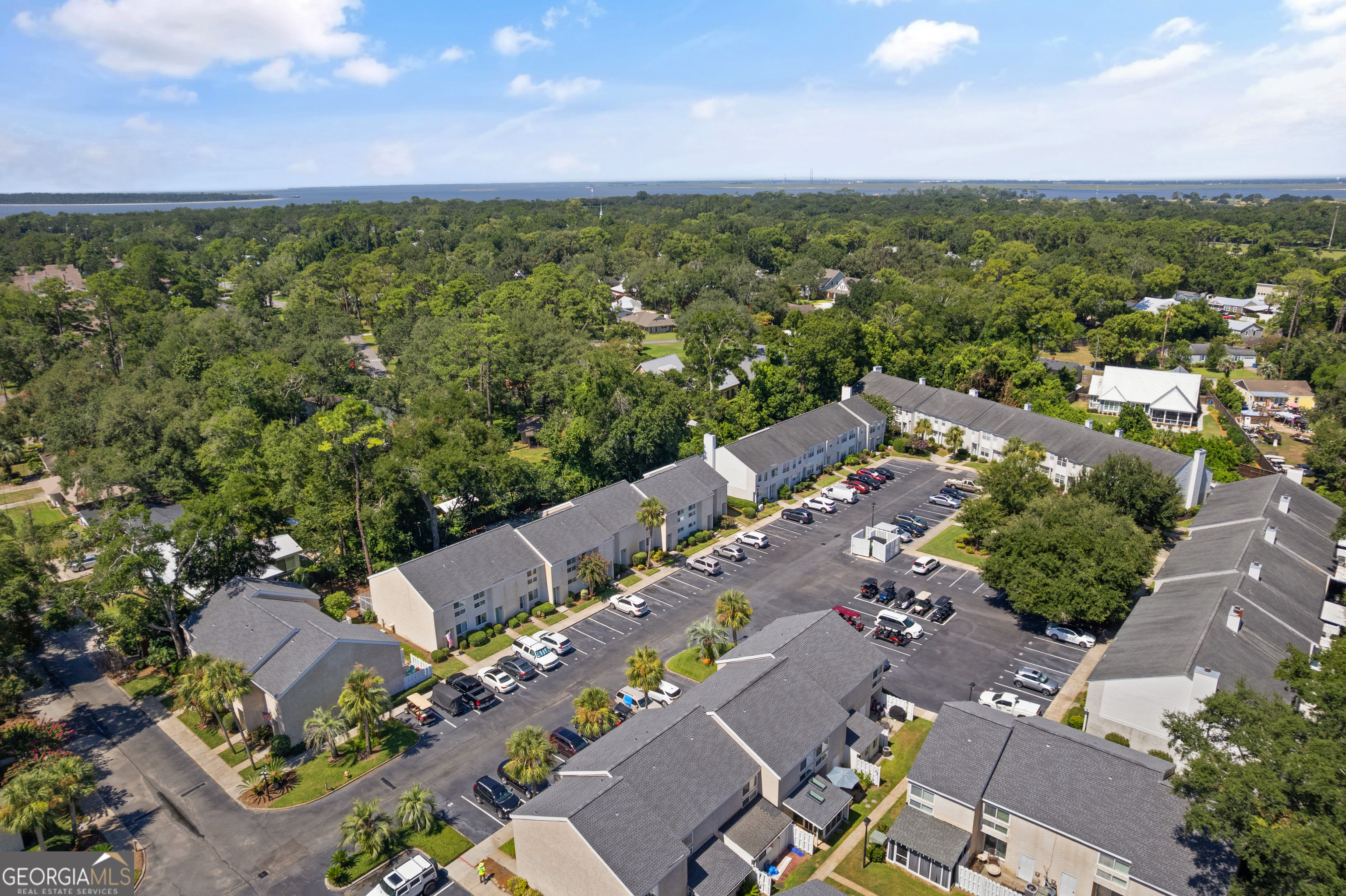 1000 Mallery St Extension, Unit B5 St. Simons, GA 31522 - Photo 4 of 24 an aerial view of a house with a yard