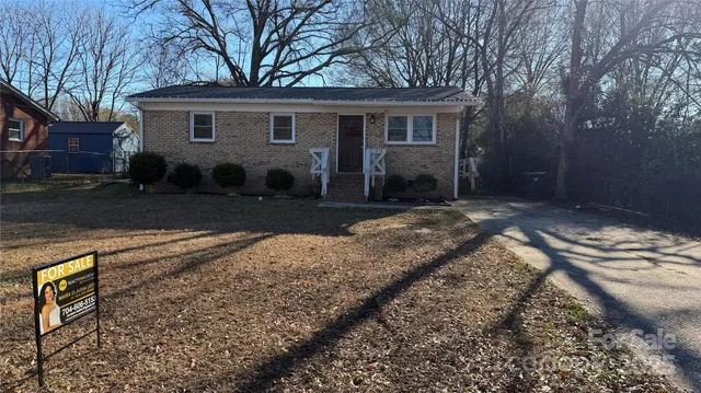 a front view of house with yard outdoor seating and yard