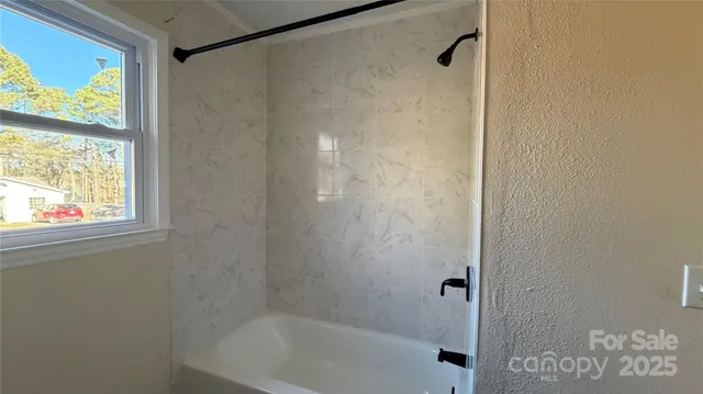 a bathroom with a bathtub