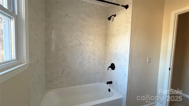 a bathroom with a bathtub