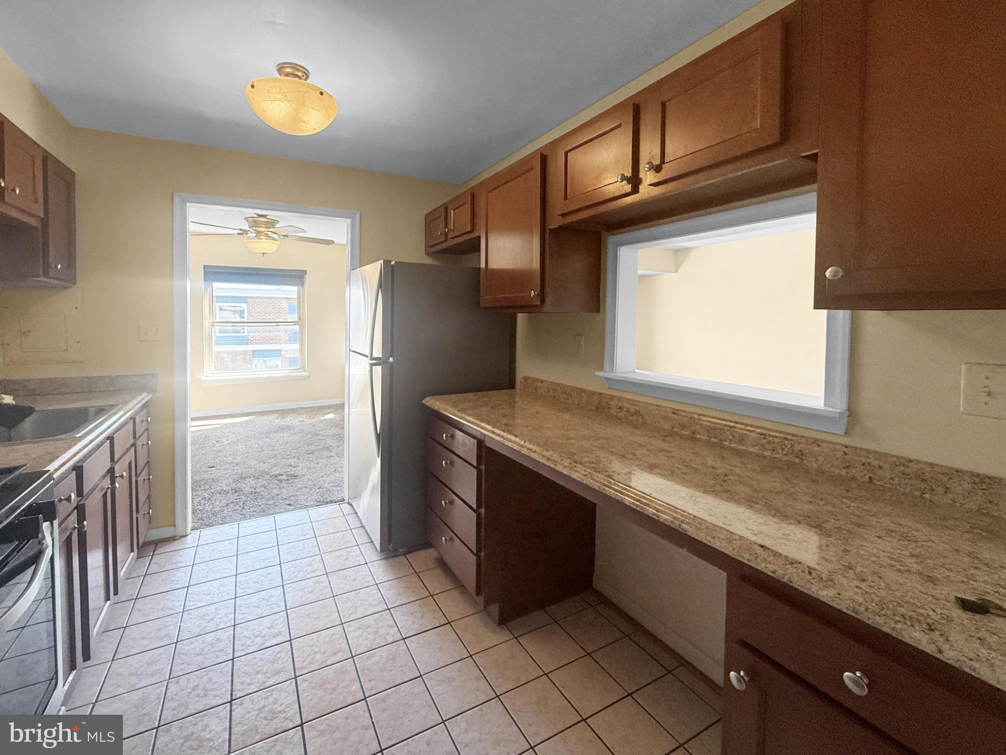 3807 St Barnabas Road, Unit 203 Suitland, MD 20746 - Photo 4 of 23 Bright kitchen with modern finishes.