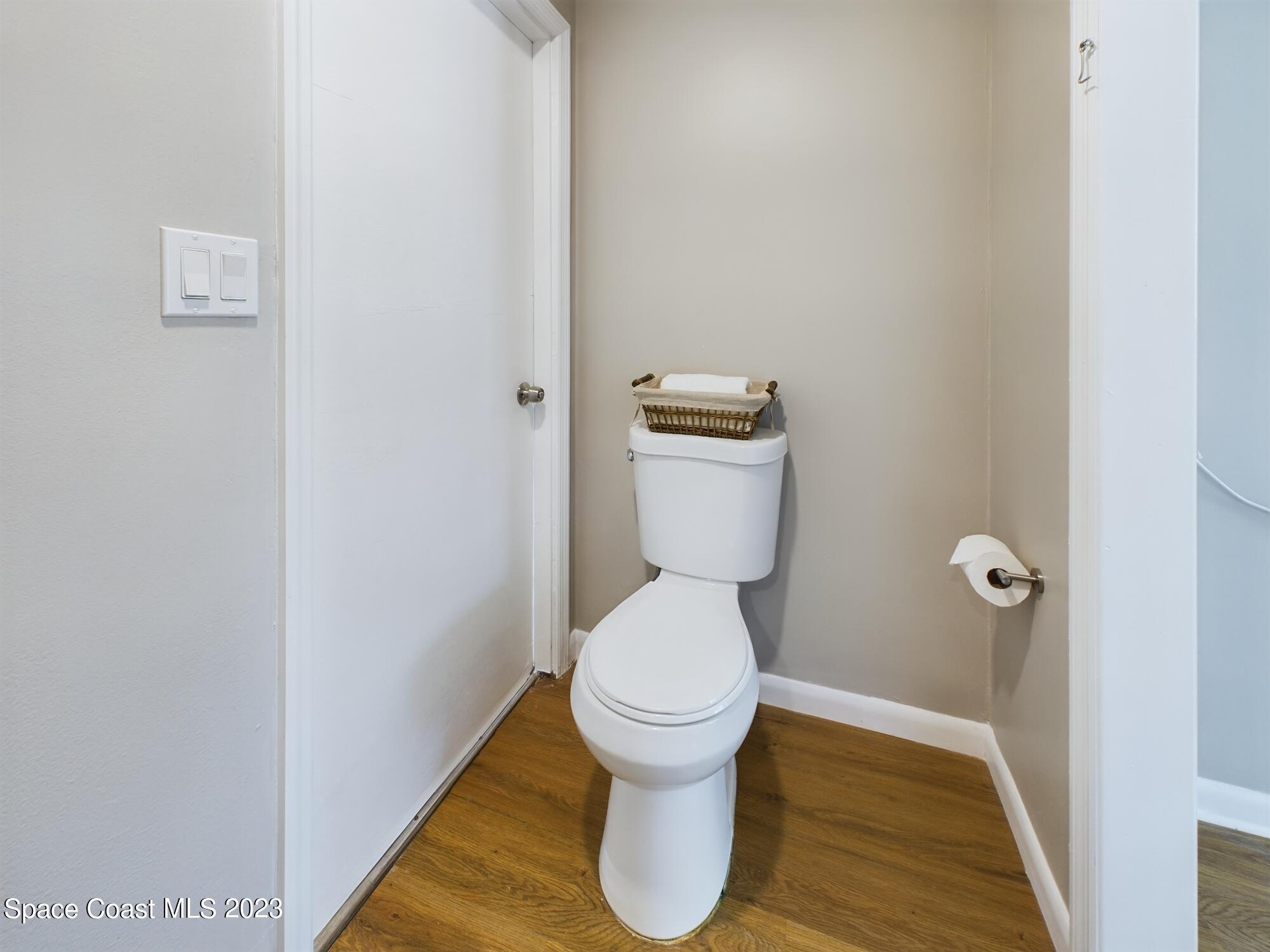 344 Columbus Street Sebastian, FL 32958 - Photo 14 of 35 a bathroom with a toilet and a sink