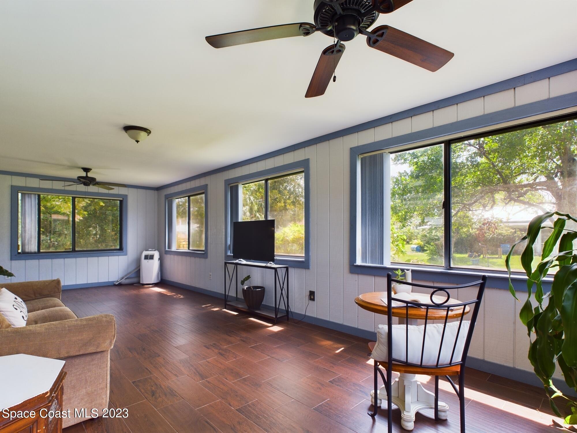 344 Columbus Street Sebastian, FL 32958 - Photo 21 of 35 a view of a livingroom with furniture window and outside view