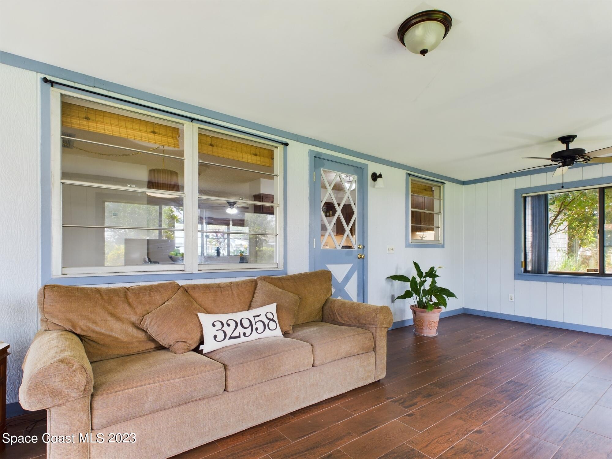 344 Columbus Street Sebastian, FL 32958 - Photo 22 of 35 a living room with furniture and window