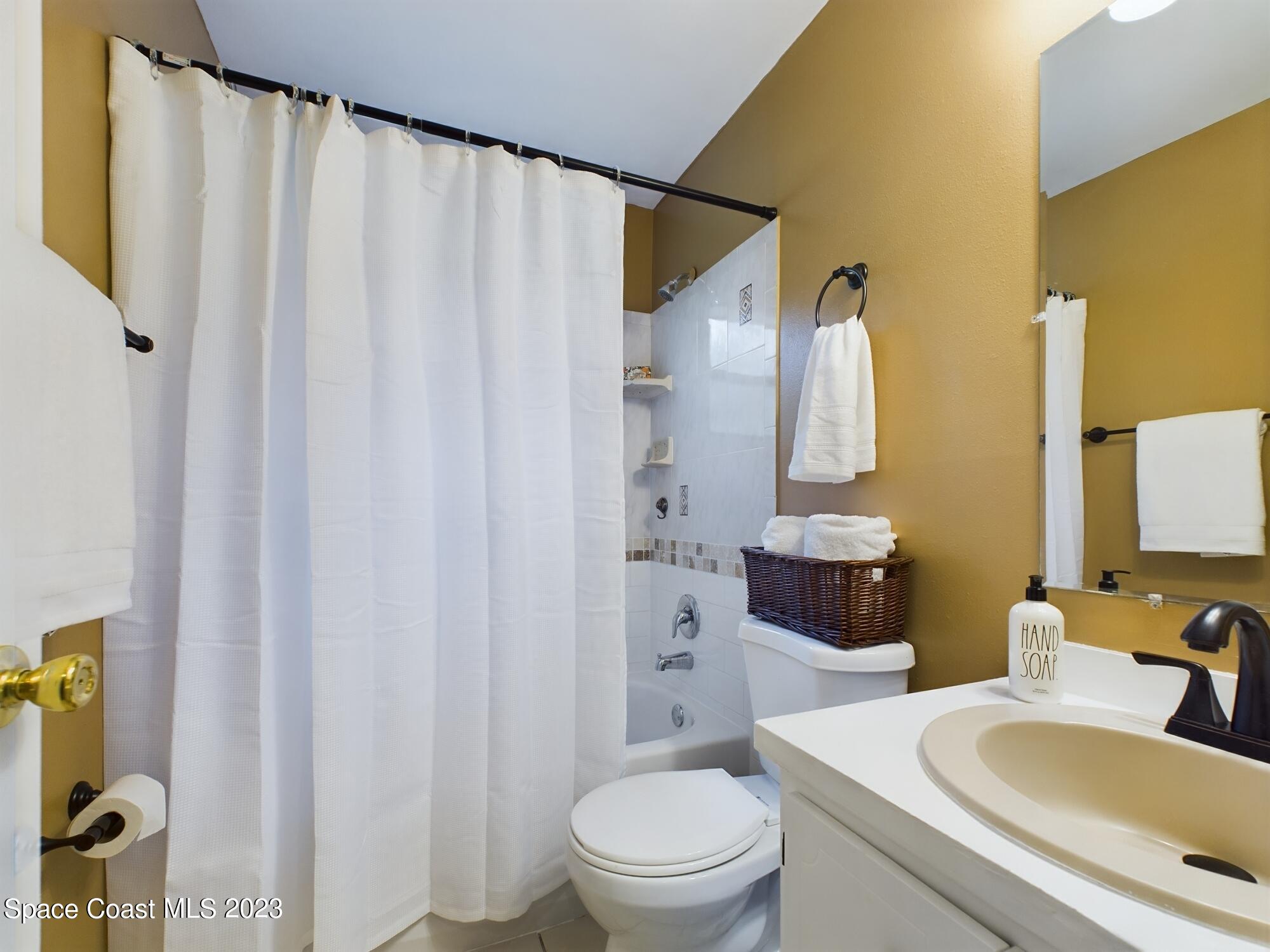 344 Columbus Street Sebastian, FL 32958 - Photo 26 of 35 a bathroom with a sink and toilet