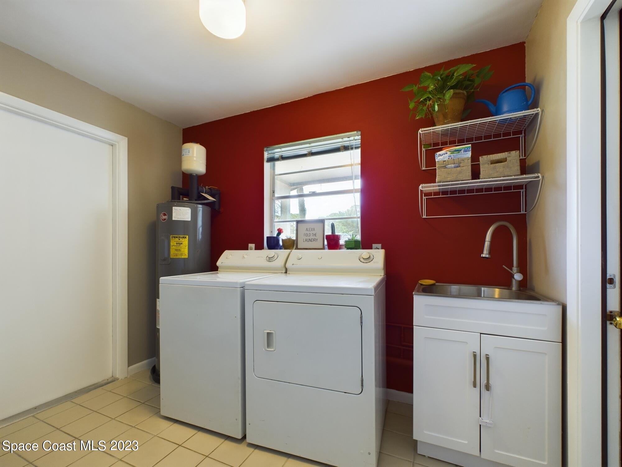344 Columbus Street Sebastian, FL 32958 - Photo 8 of 35 a utility room with dryer and washer