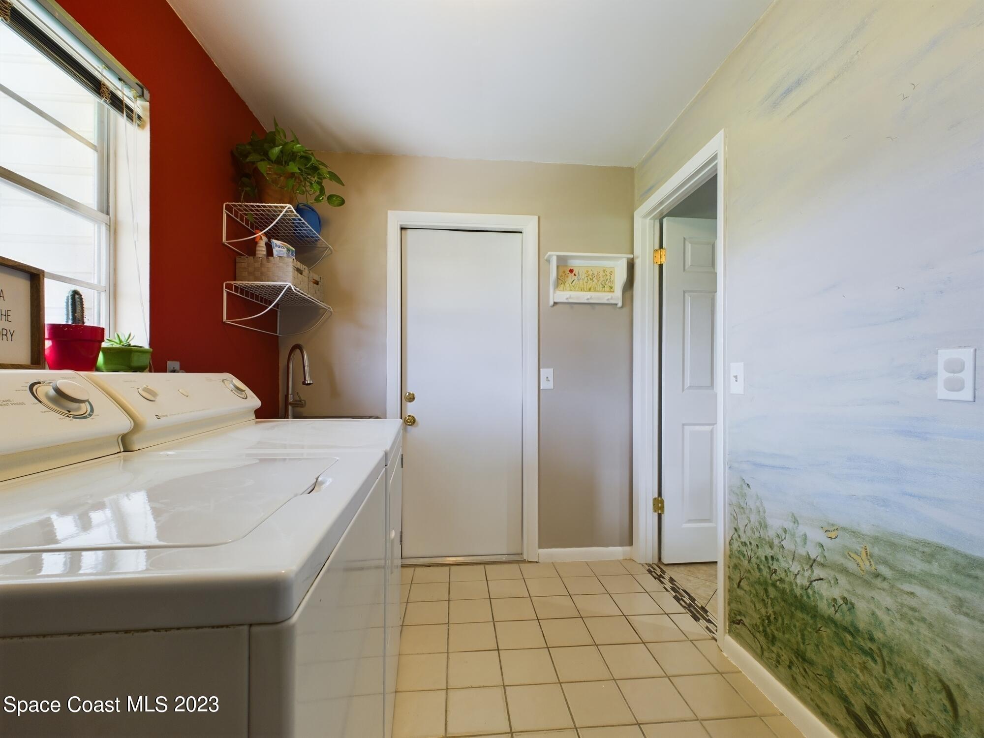344 Columbus Street Sebastian, FL 32958 - Photo 9 of 35 a bathroom with a sink and a mirror