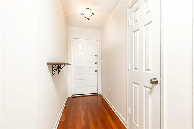 a bathroom with a shower and a toilet