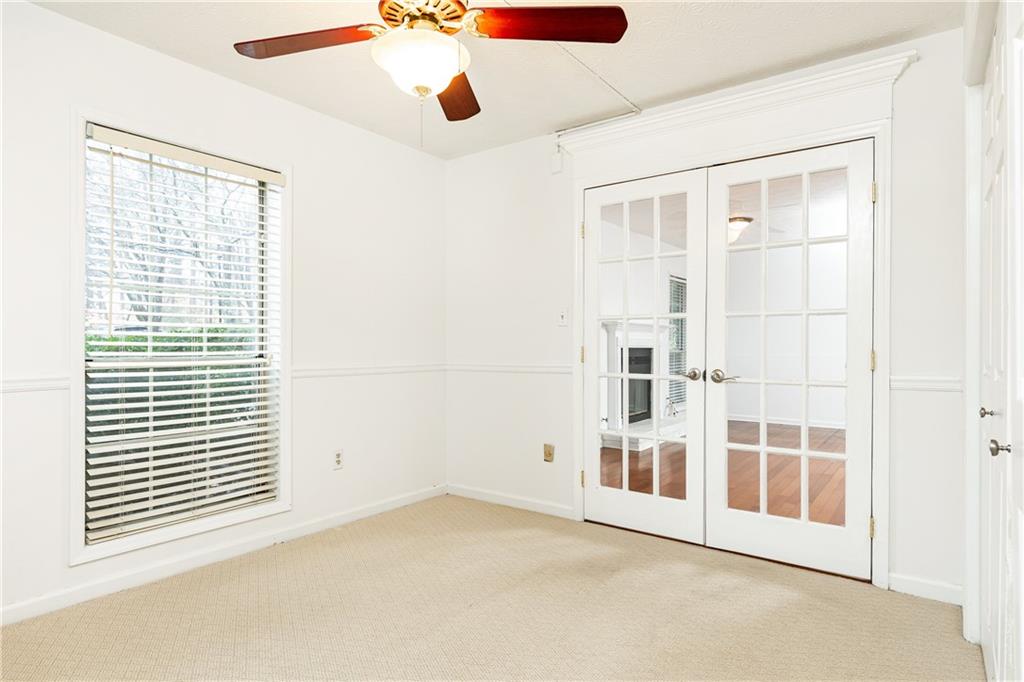 2901 Lenox Way Northeast, Unit 902 Atlanta, GA 30324 - Photo 28 of 34 an empty room with windows