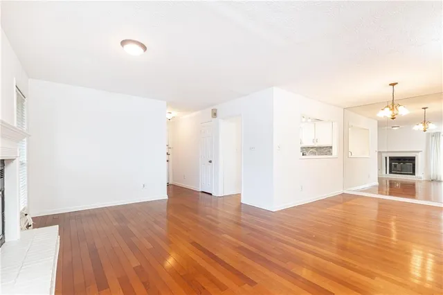 a view of a livingroom with wooden floor