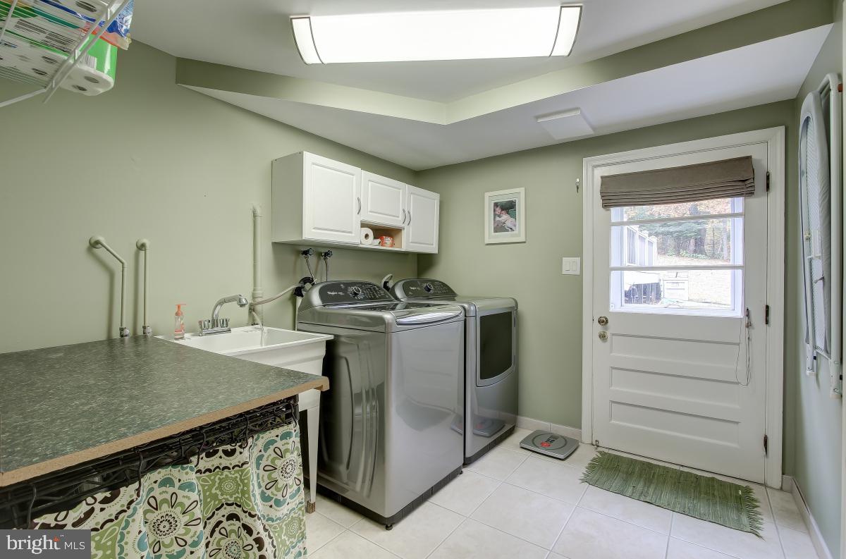 6588 Kelly Road Warrenton, VA 20187 - Photo 31 of 39 Mudroom w/ Newer Washer & Dryer, Door to Backyard